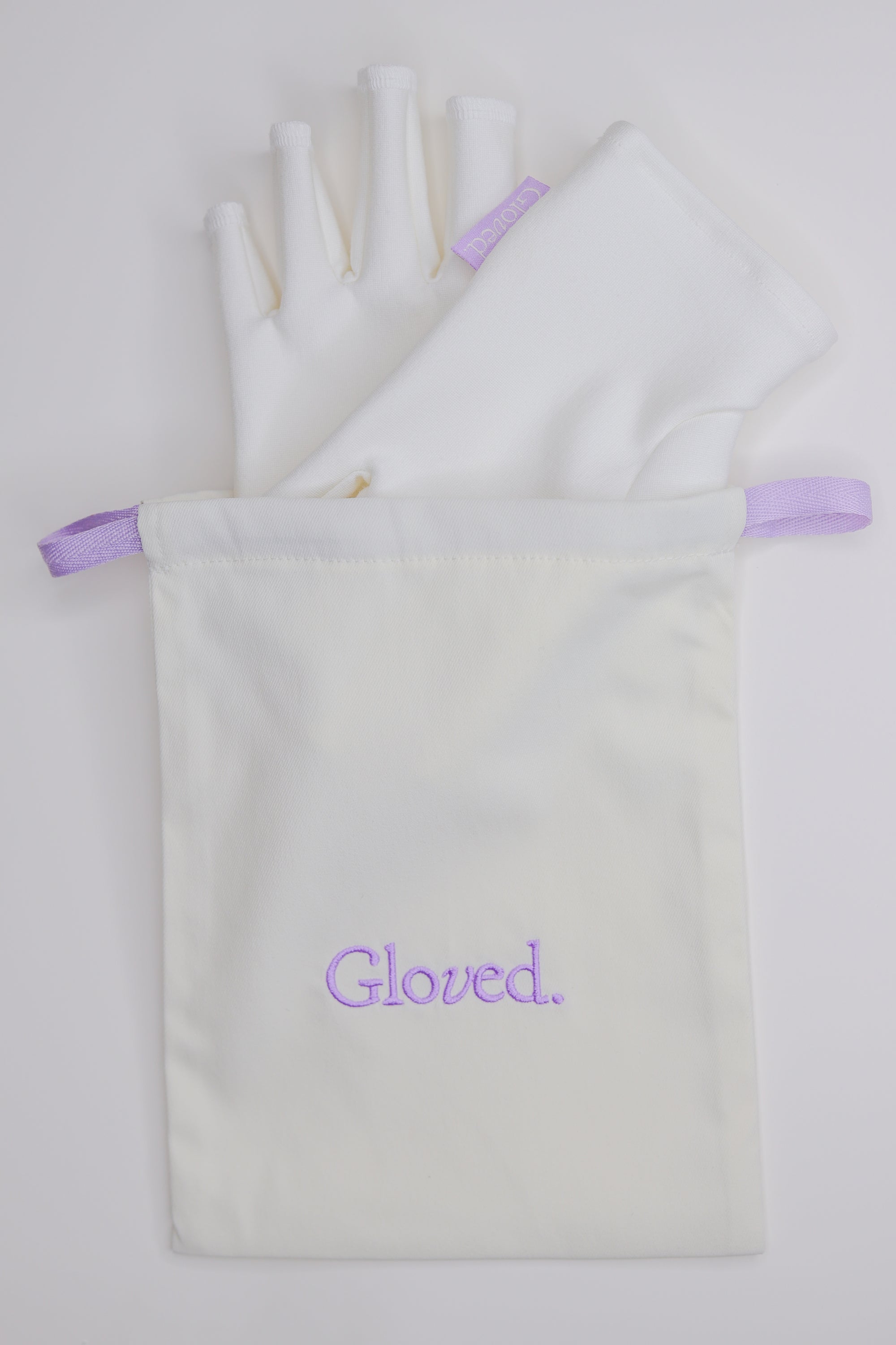gloved-off-white